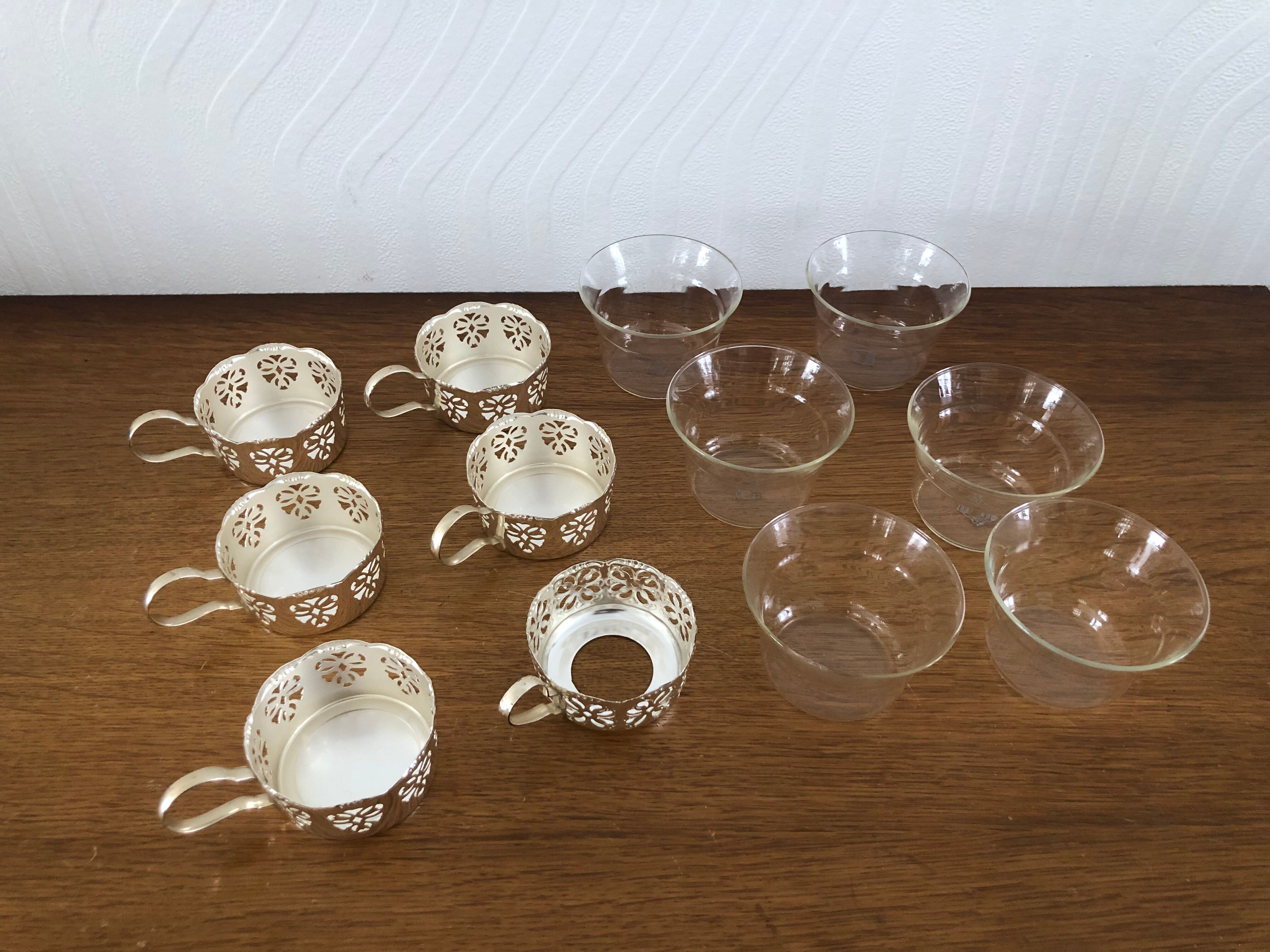 6 tea cups with silver metal support