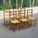Set of 6 brutalist style chairs in solid pine and woven straw from the 1970s.