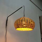Mid-century modern Danish extendable cantilever wall lamp with a rattan shade, 1960s.