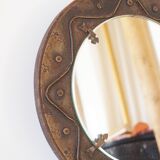 Decorative mirror in wood and gold metal