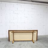 French wardrobe with tapered legs, 3 doors, 1 mirror (27*130), and 1 drawer.