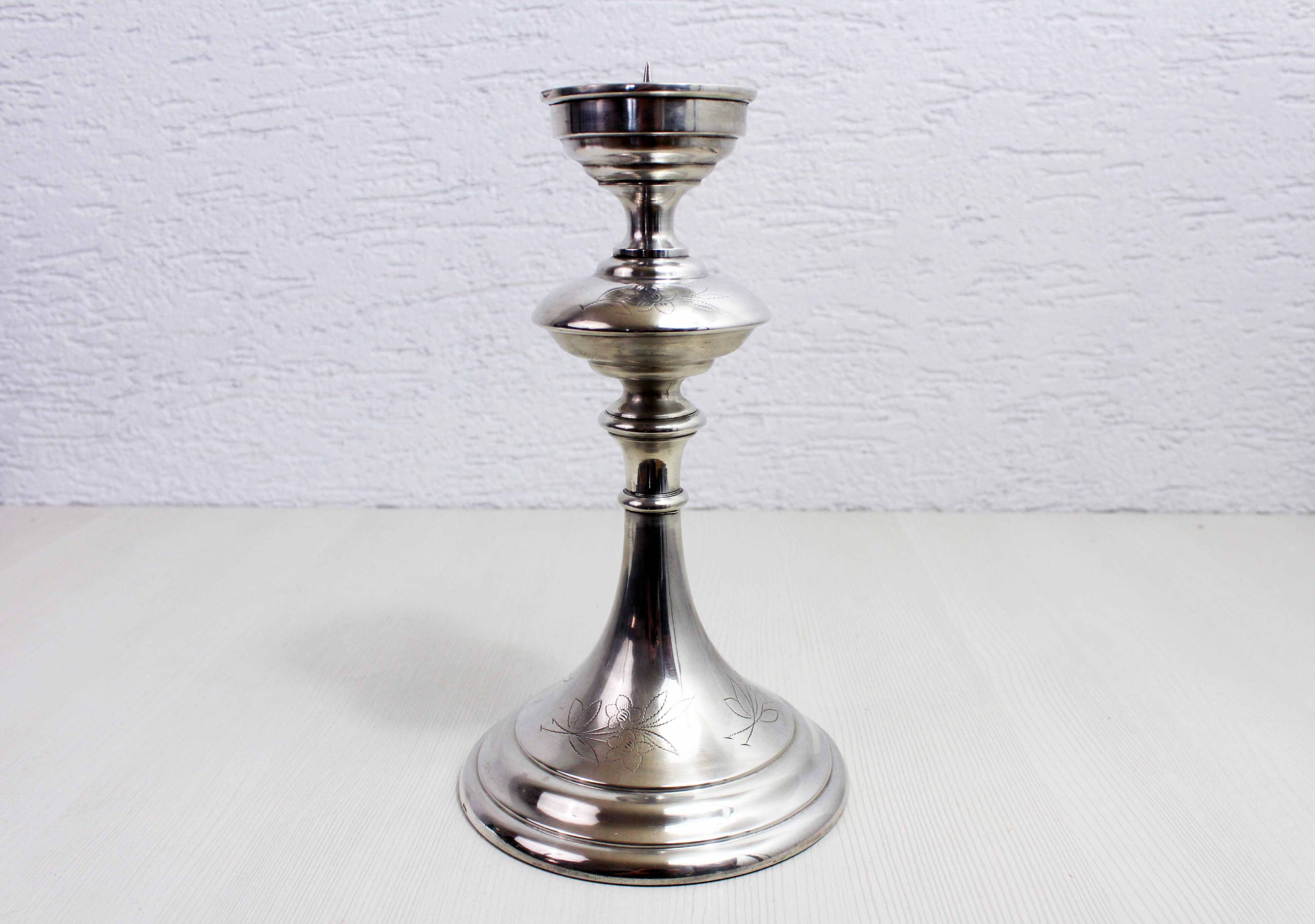 Silver metal candle holder