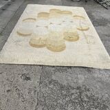 Large rug with flower decoration.