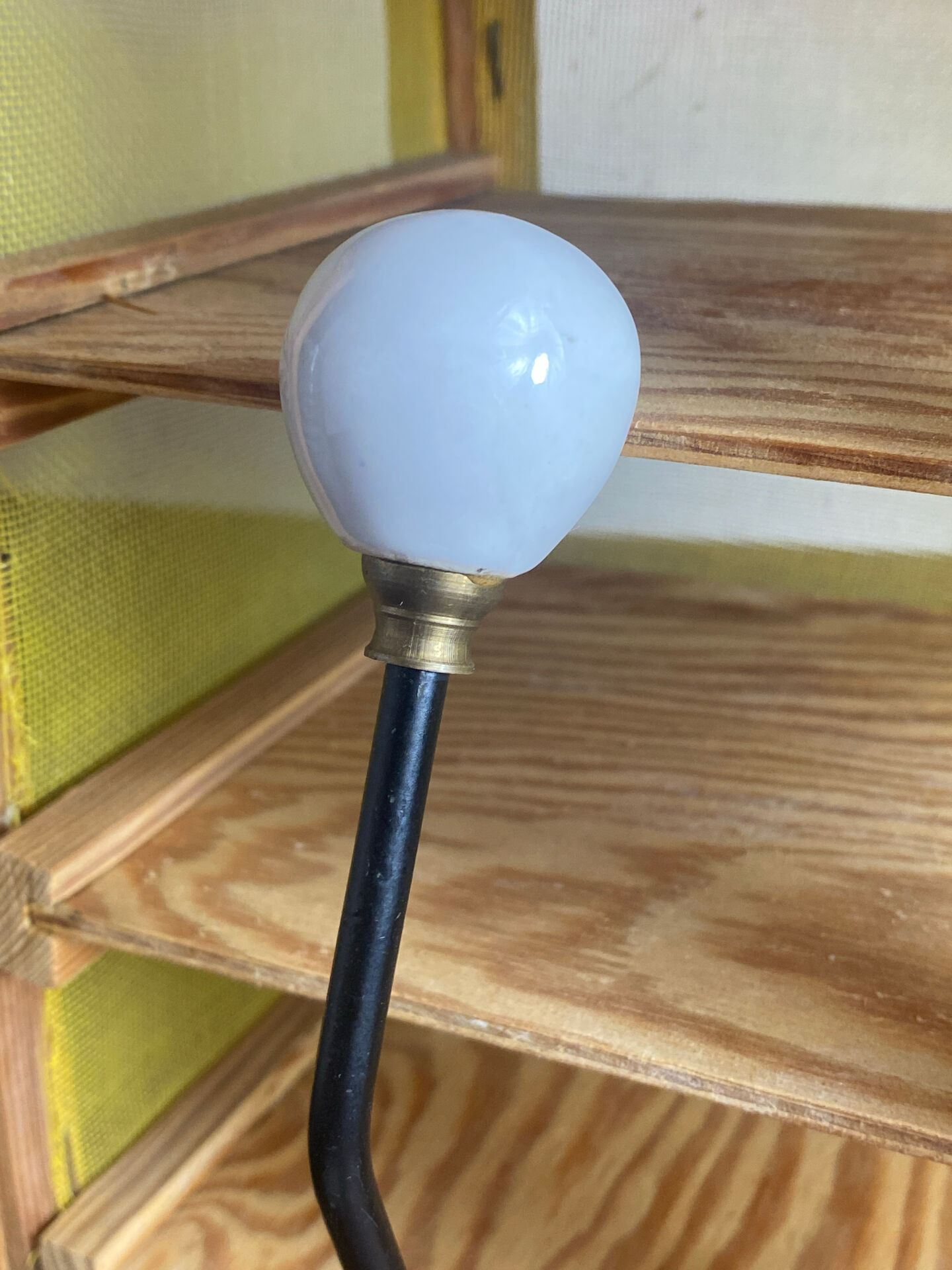 Metal and porcelain hook