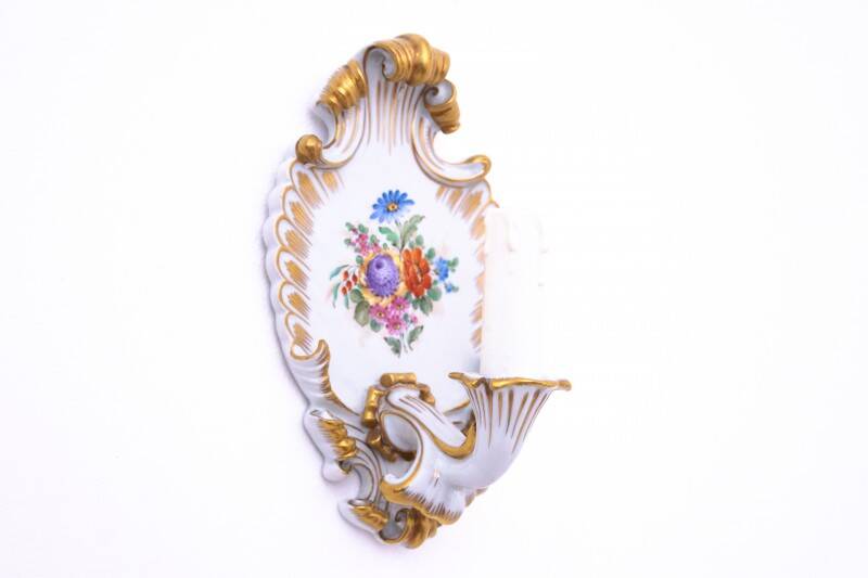A pair of porcelain wall lamps from Capodimonte, Italy.