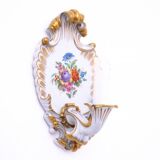 A pair of porcelain wall lamps from Capodimonte, Italy.