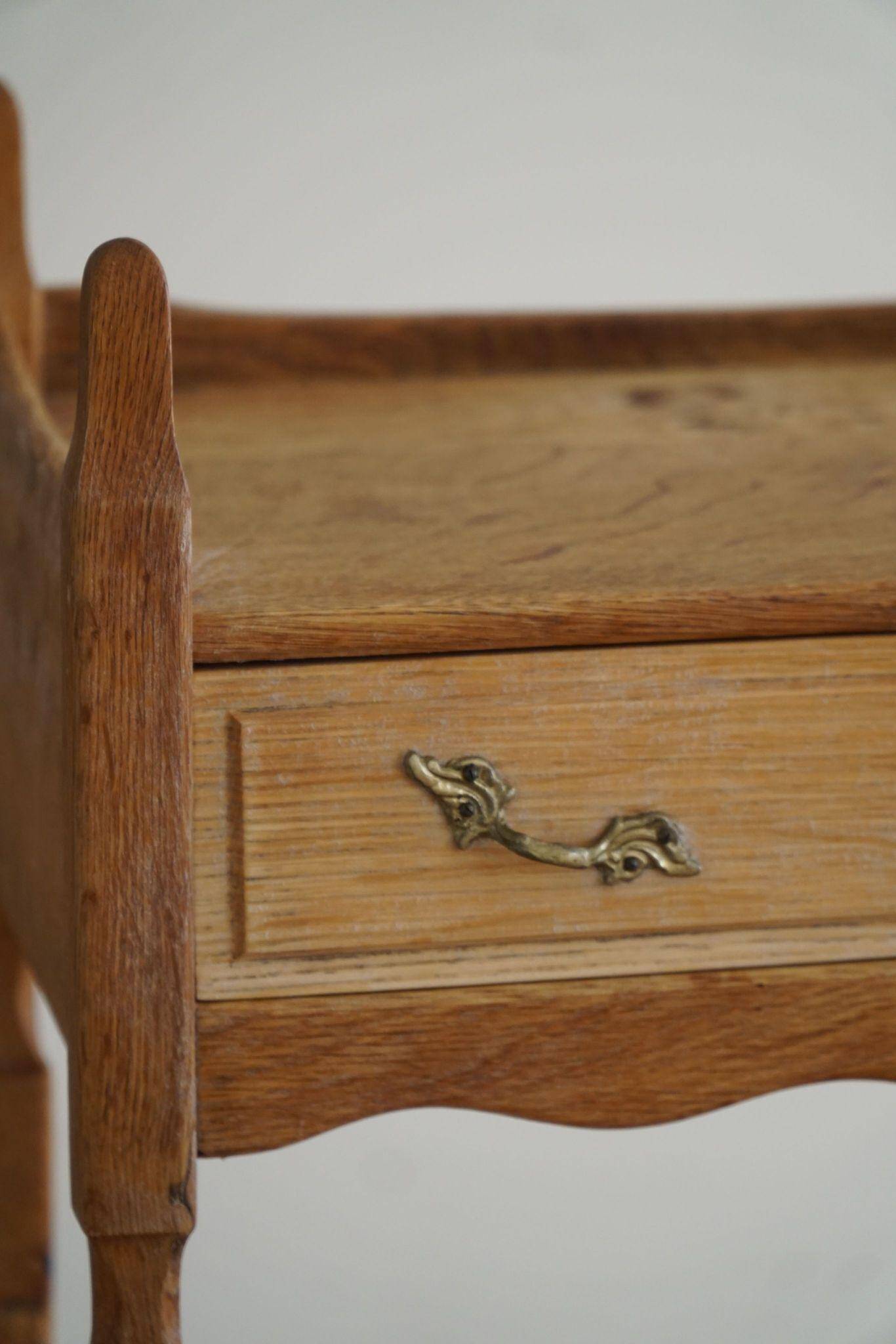 Henning Kjærnulf, oak bedside table, modern Danish, "Razorblade", 1960s