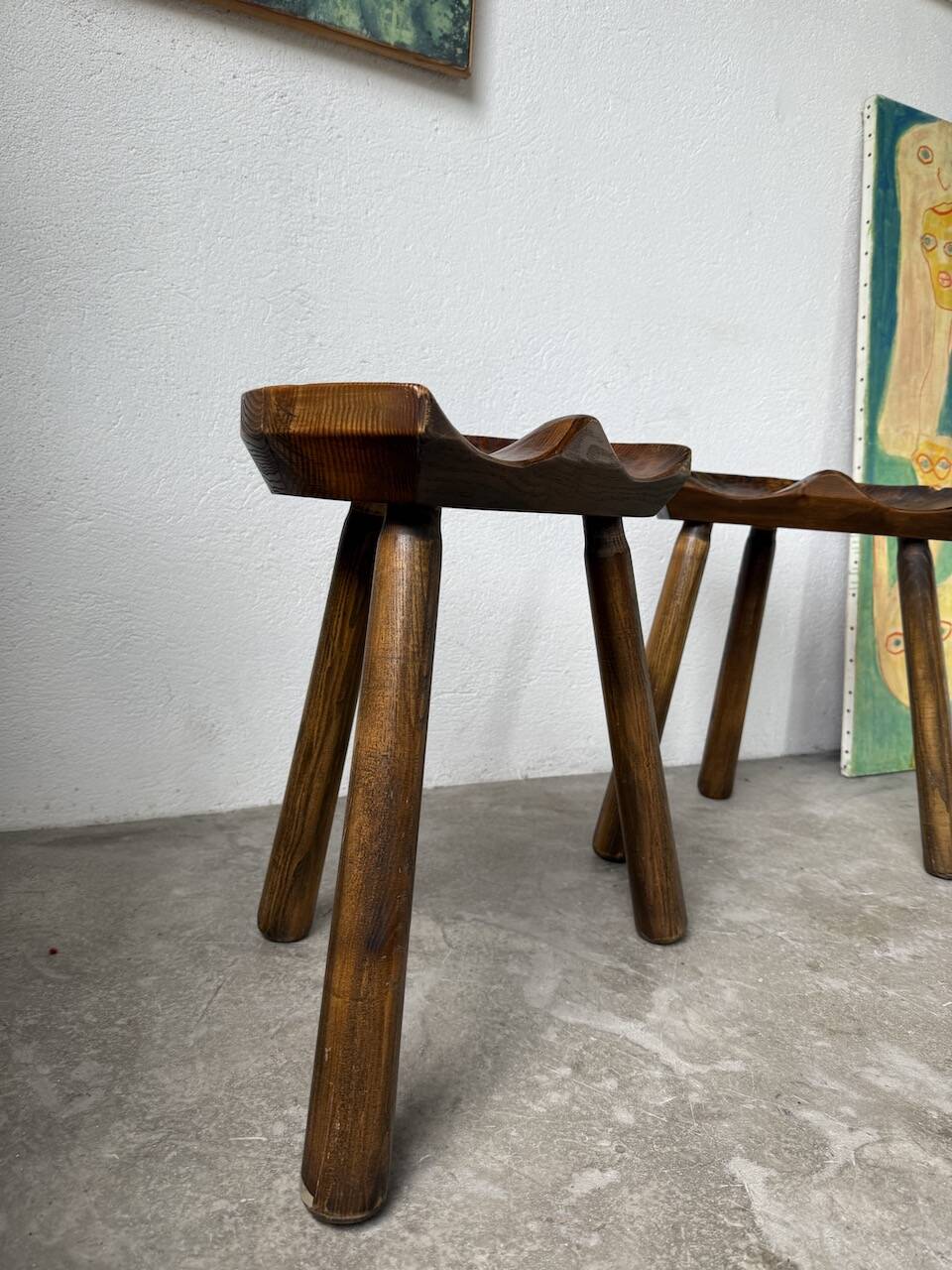 Pair of Le Selou tripod shepherd's stools