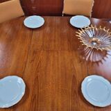 Baumann style round table with integrated extensions from the 70s