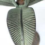 Ancien bougeoir en forme de palmier en métal patiné