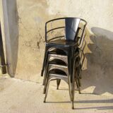 Four stackable chairs with industrial style