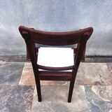 Scandinavian chair in wood and woven natural fibre.