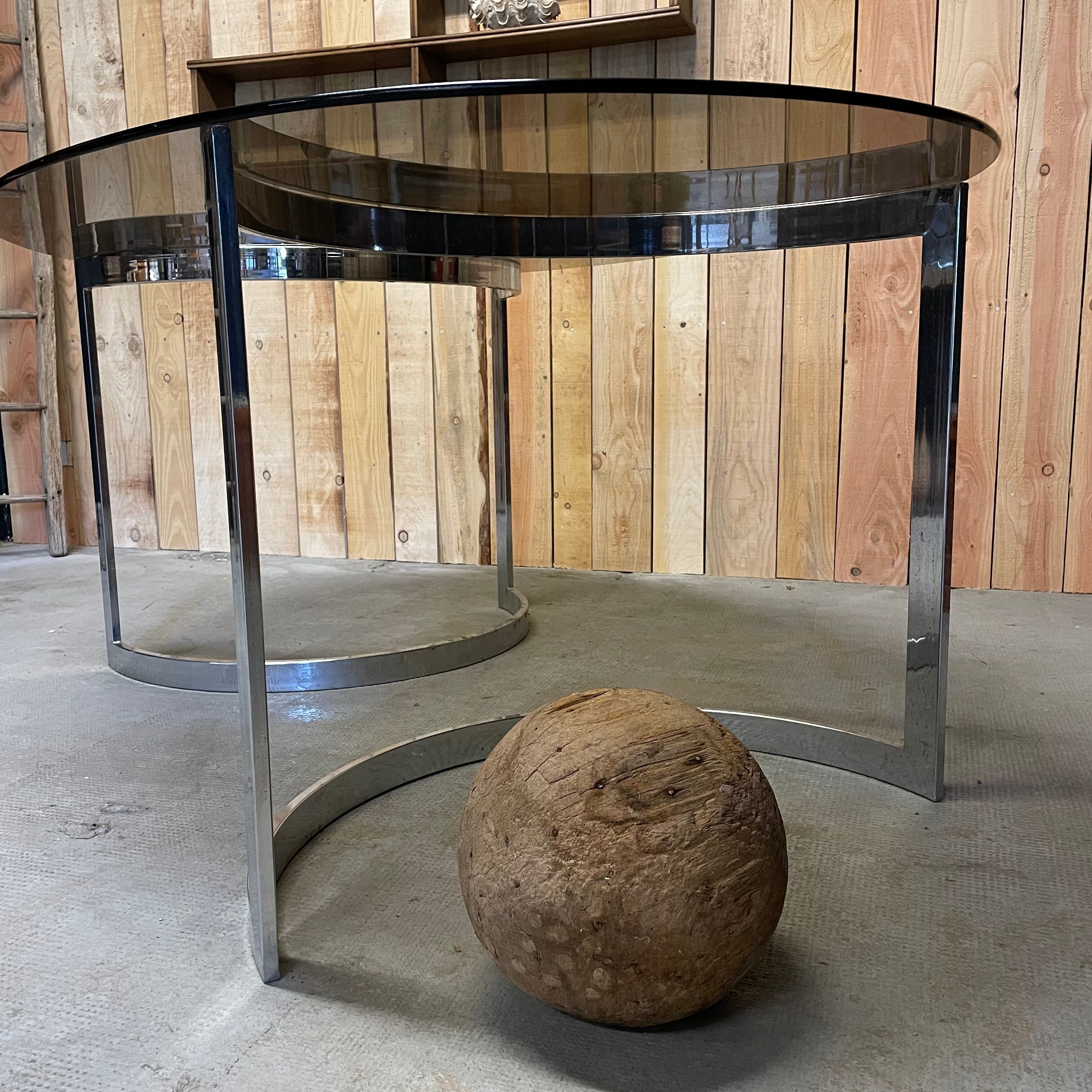 Glass oval dining table by Milo Baughman