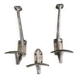 Trio of metal hooks