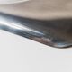 1990s vintage stainless steel platter, rectangular with an oval indentation, minimalist modern design.
