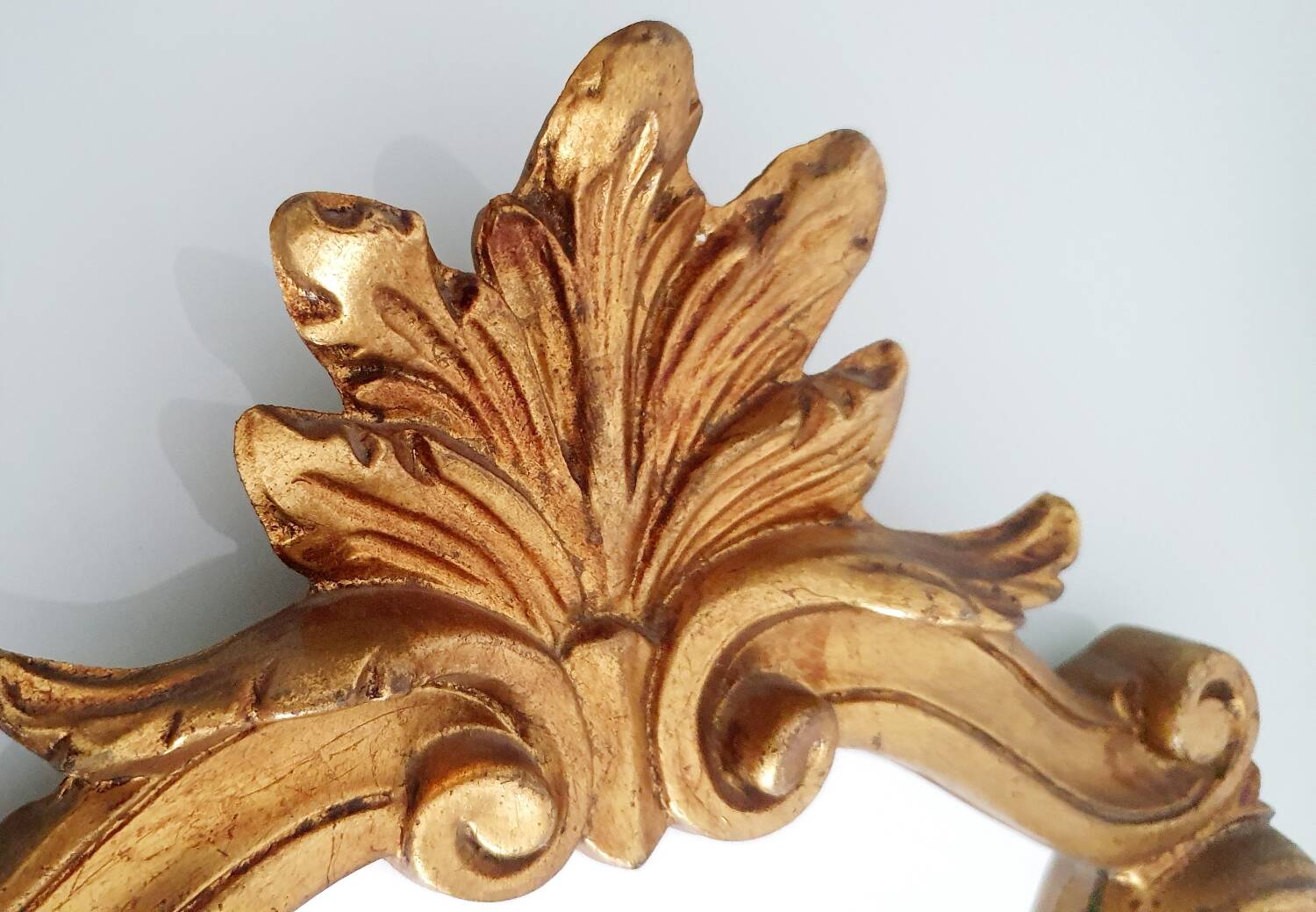 Baroque mirror gilded with gold leaf