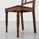 Art Deco oak side chair with carved rosette back and turned front legs, Bel