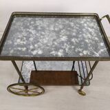Brass and glass rolling trolley