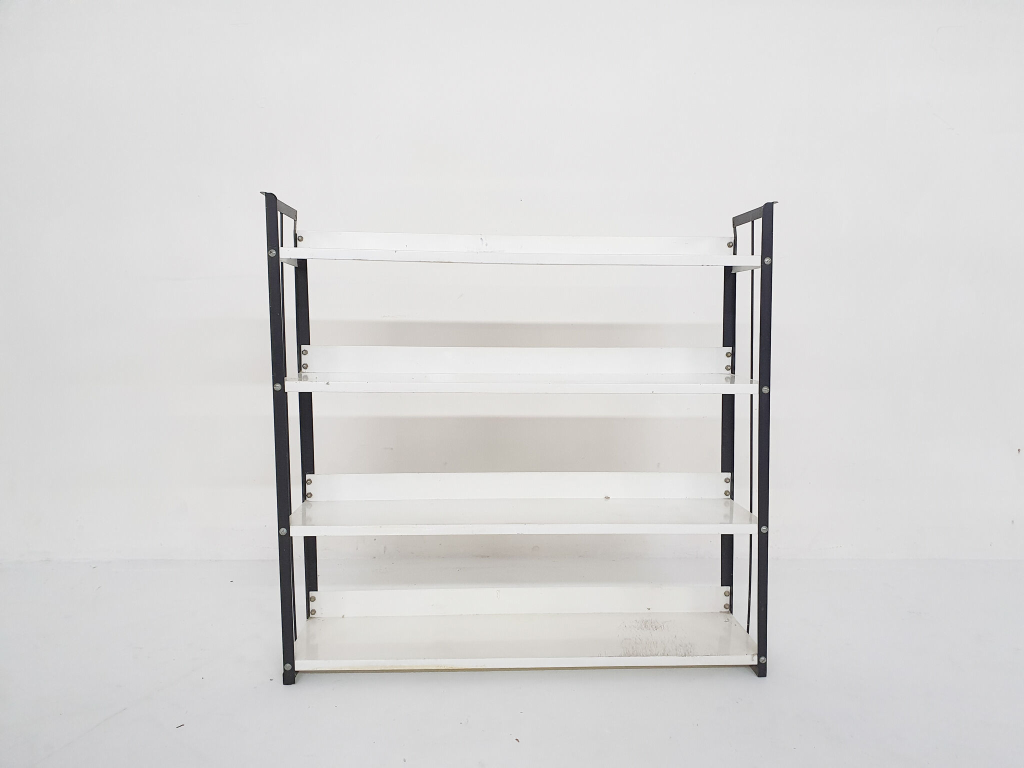 Black and white metal book shelves attrb. to Tomado, Holland, 1950's