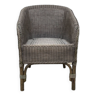 Khaki rattan armchair