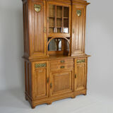 Art Nouveau oak buffet and dinanderie panels, circa 1910