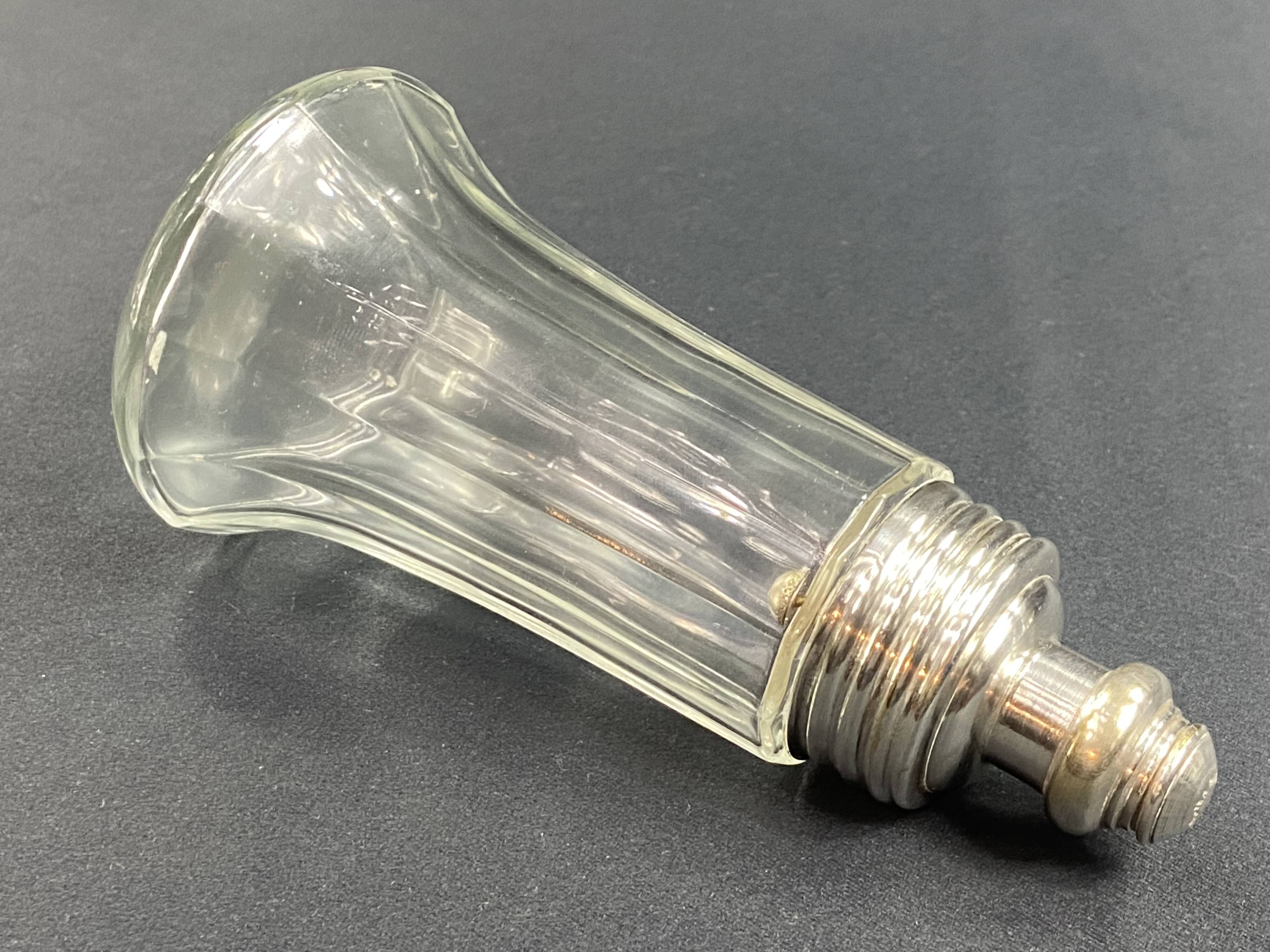 Glass and silver metal sugar shaker