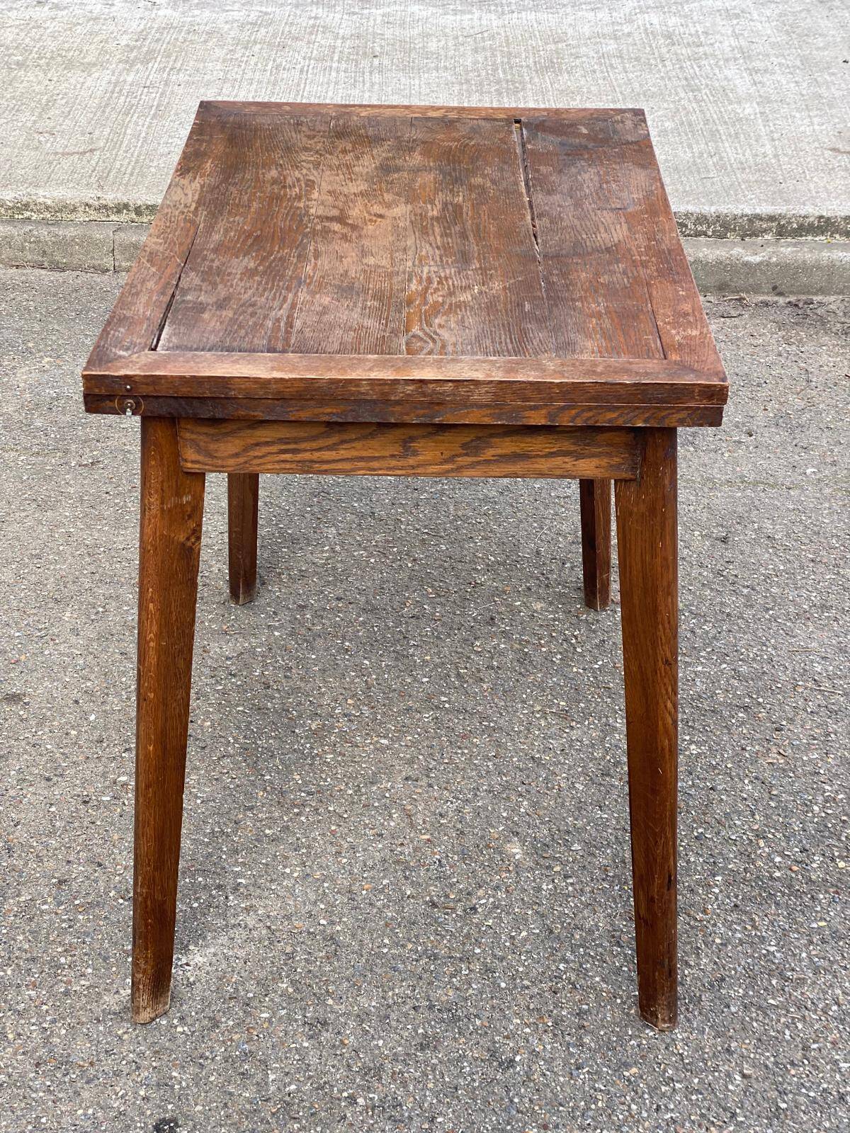 Scandinavian extendable dining table with storage in 19th-century oak.