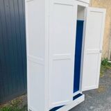 Antique white Parisian wardrobe with Majorelle blue interior
