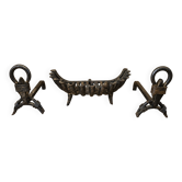Important wrought iron fireplace accessories – Andirons and log basket