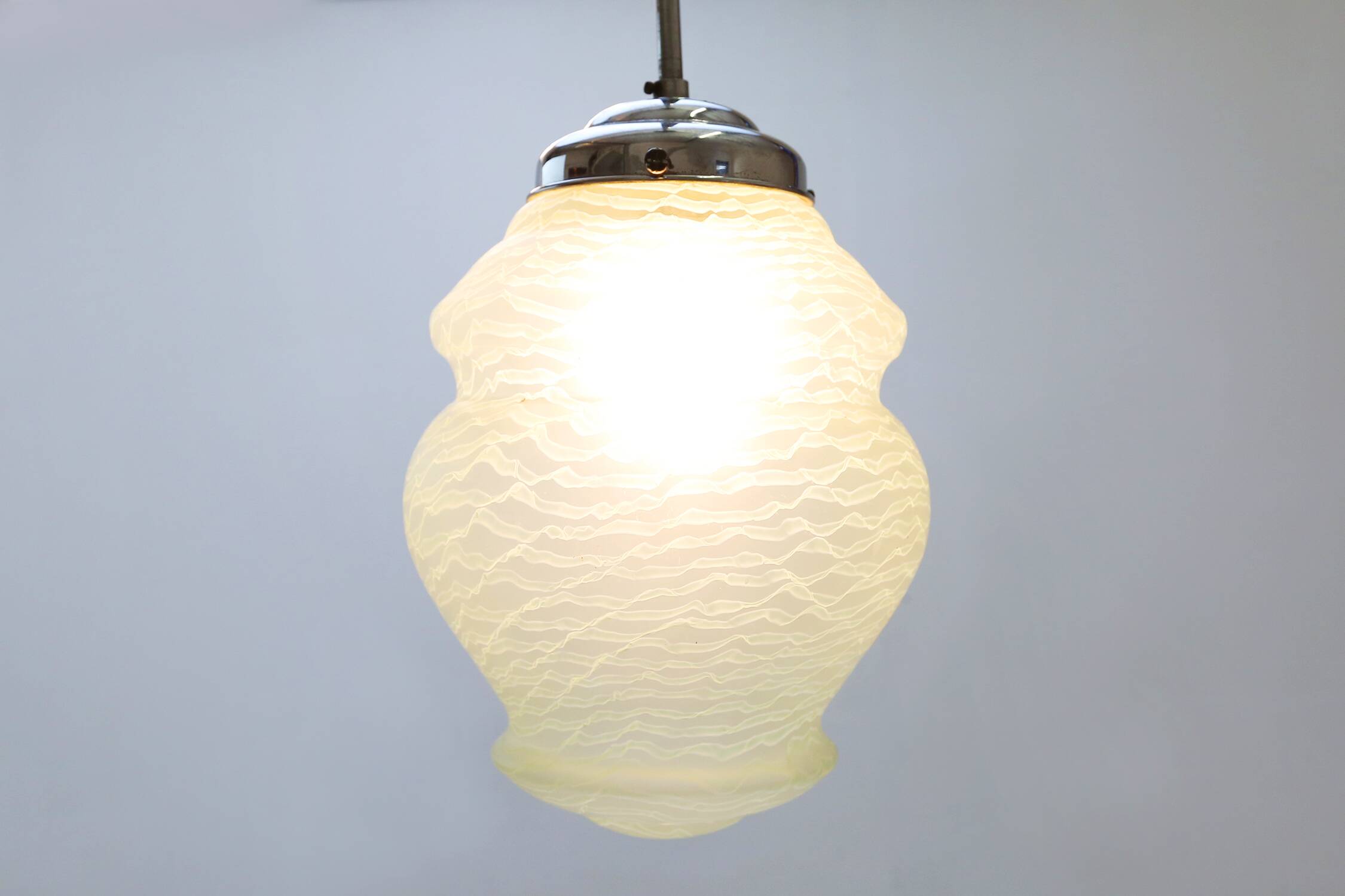 Art Deco pendant lamp with green glass shade, France ca. 1940