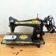 Singer - old sewing machine - black lacquer with golden patterns - very decorative