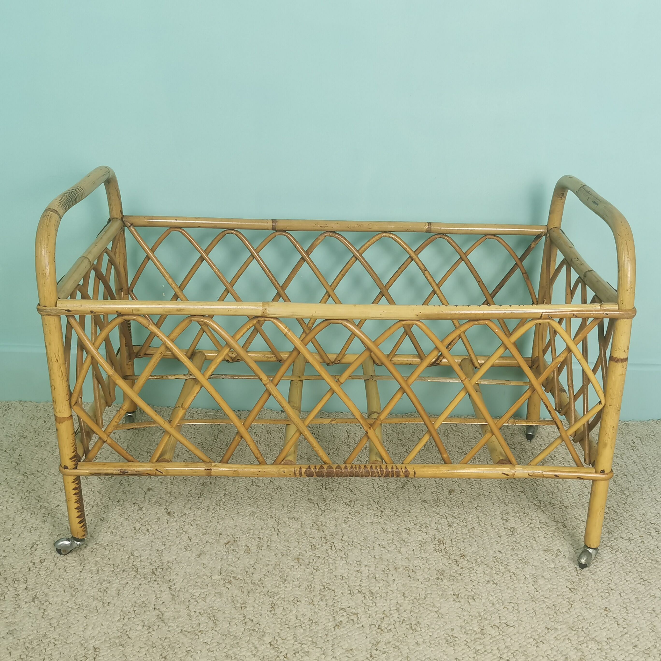 Rattan doll bed
