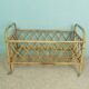 Rattan doll bed