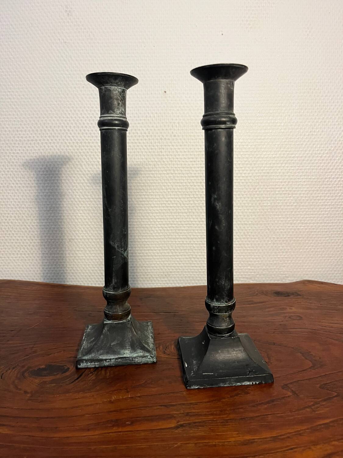 Pair of removable patinated brass candlesticks