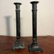 Pair of removable patinated brass candlesticks