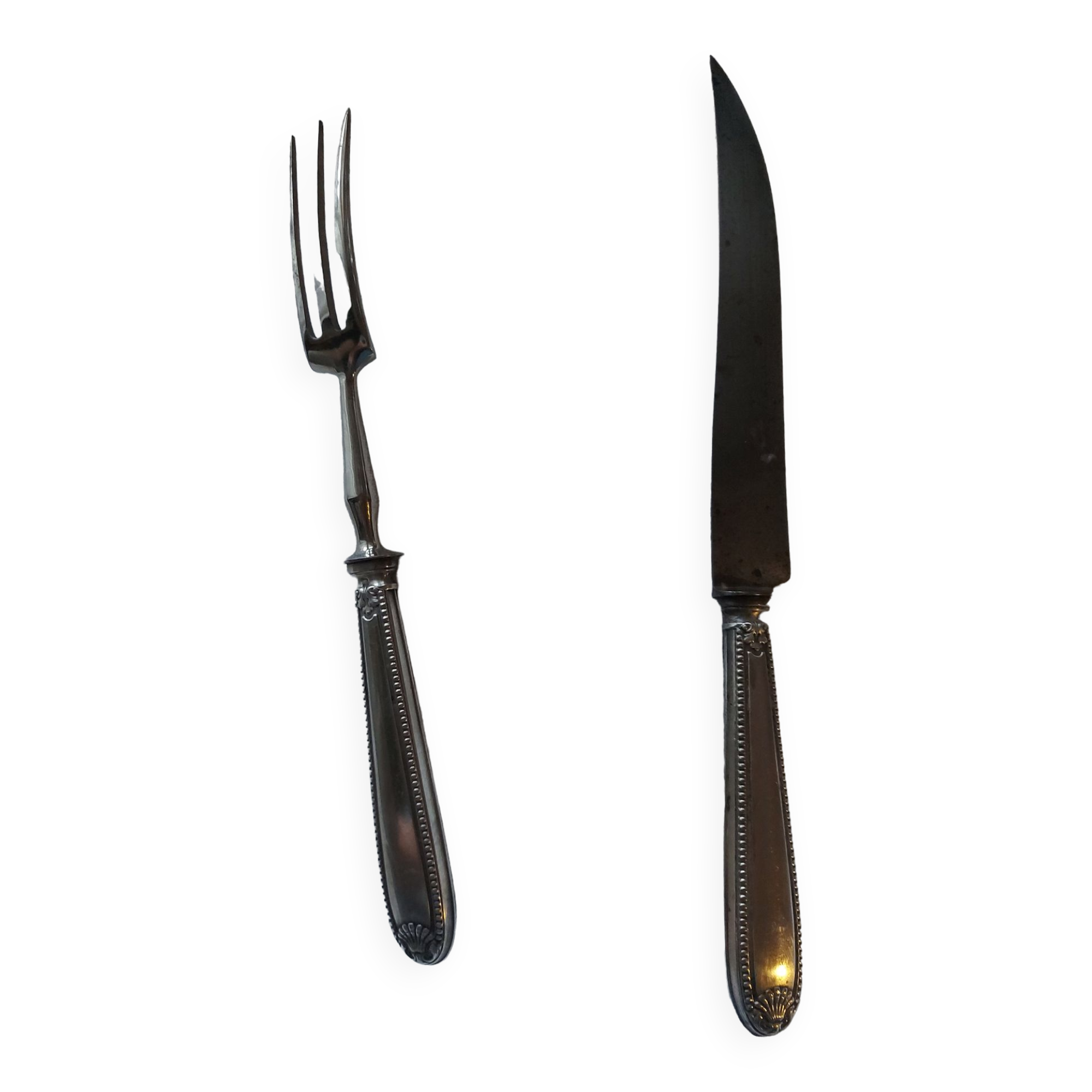 Serving, silvered metal leg cutlery