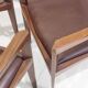 Set of six Italian wooden dining chairs in dark brown faux leather.