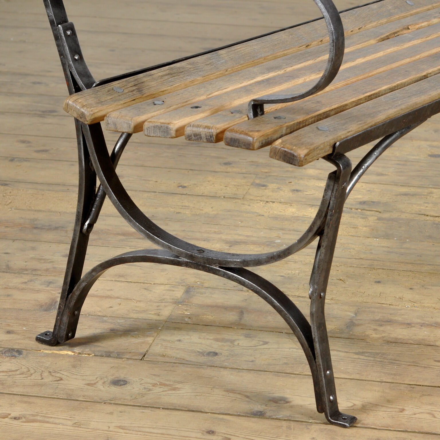 Riveted iron park bench 1920s