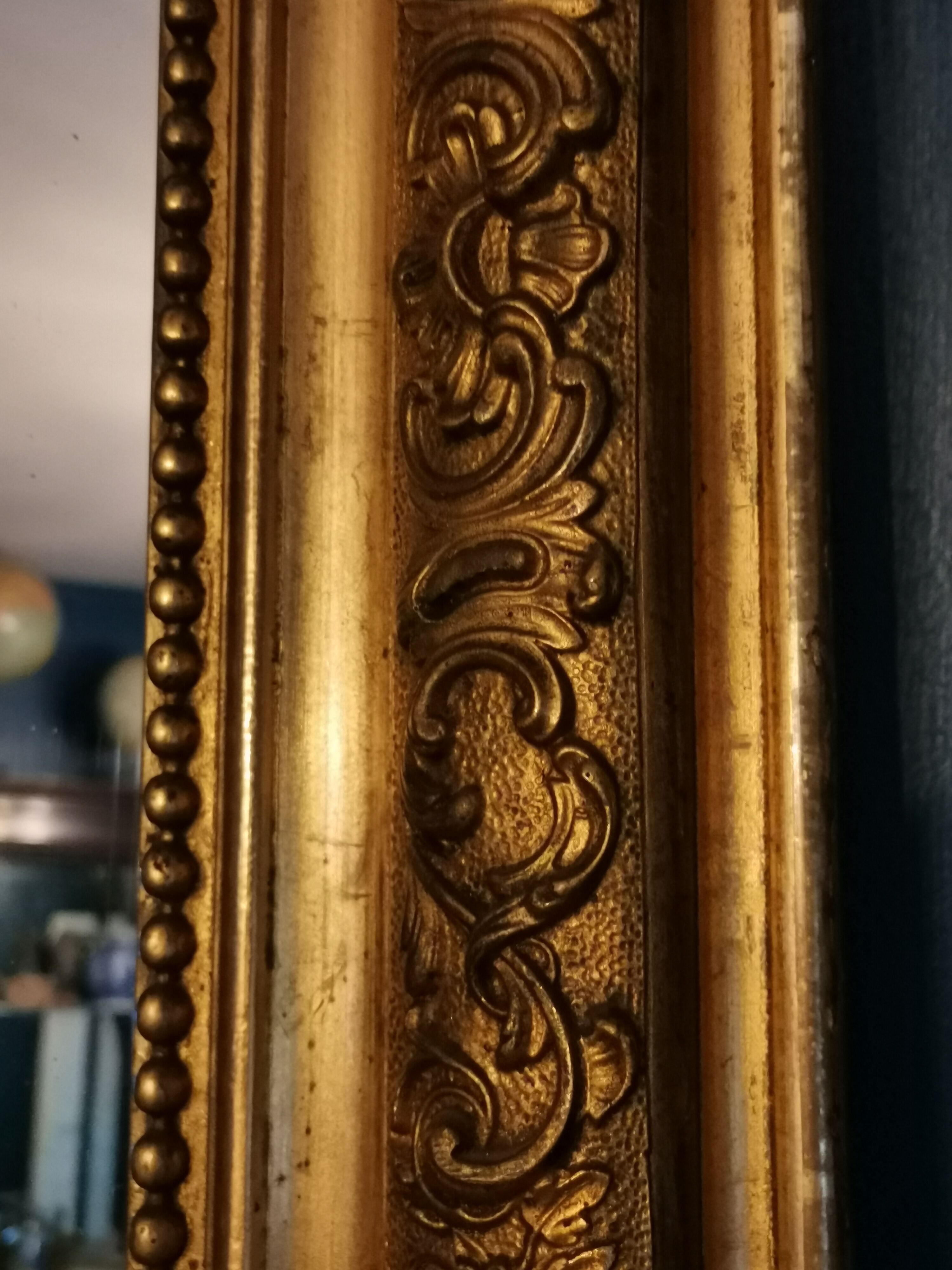 Mirror XIXth in gilded stucco, H 142 cm