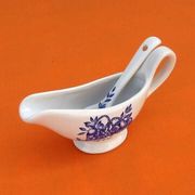 White porcelain gravy boat, fruit basket decor