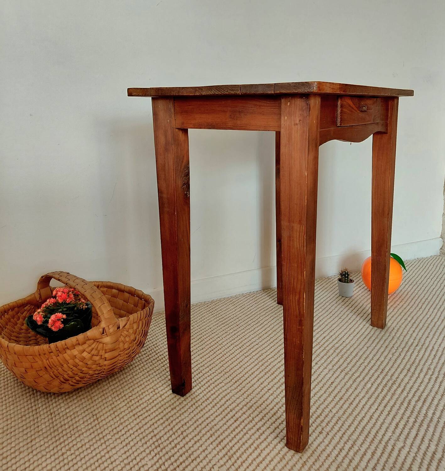 Small antique solid wood table in chic country style with a drawer.