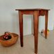 Small antique solid wood table in chic country style with a drawer.