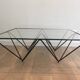 Black lacquered metal coffee table with a clear glass top. Attributed to Paolo Piva.