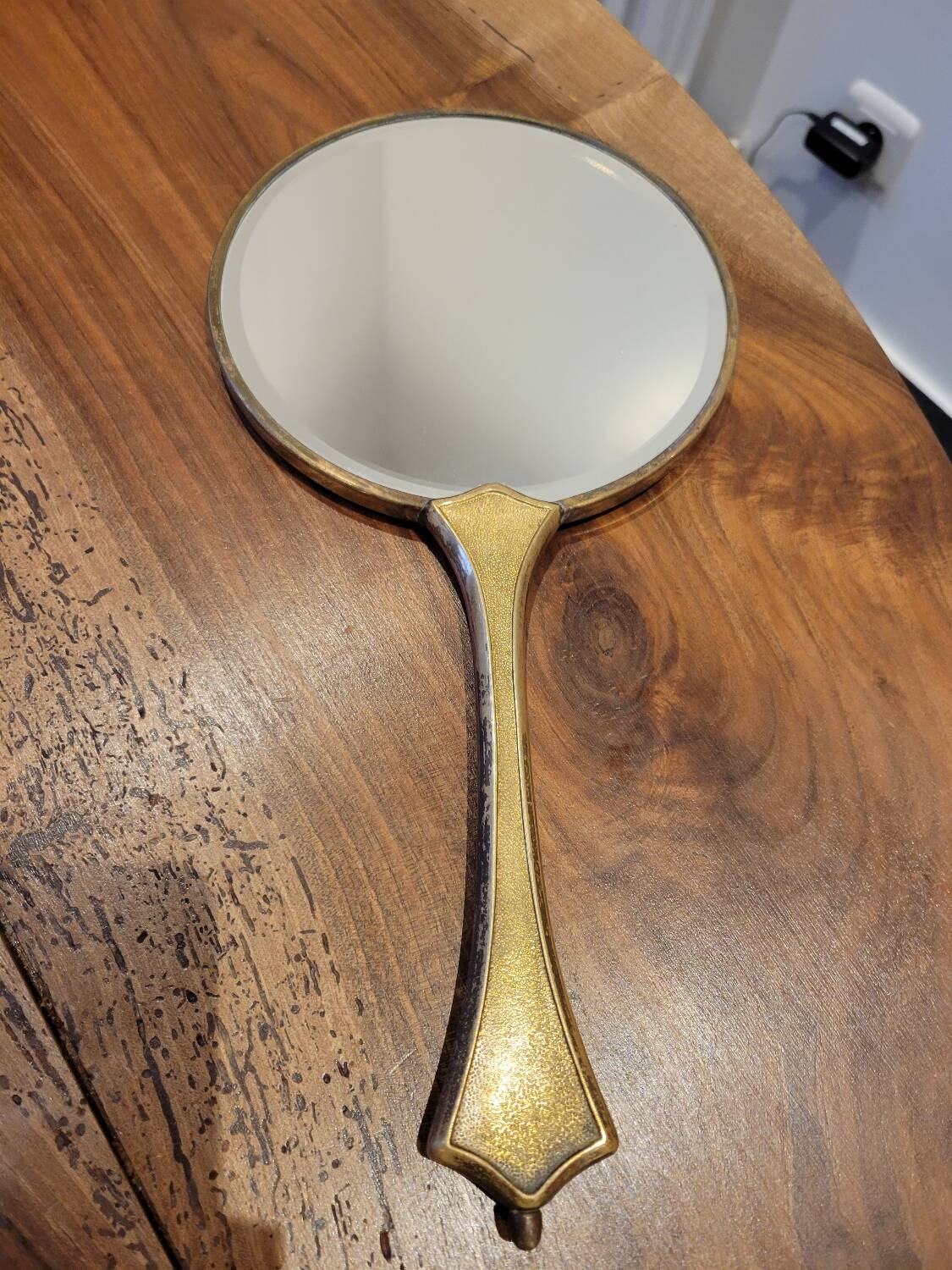Brass hand mirror with magnifying back
