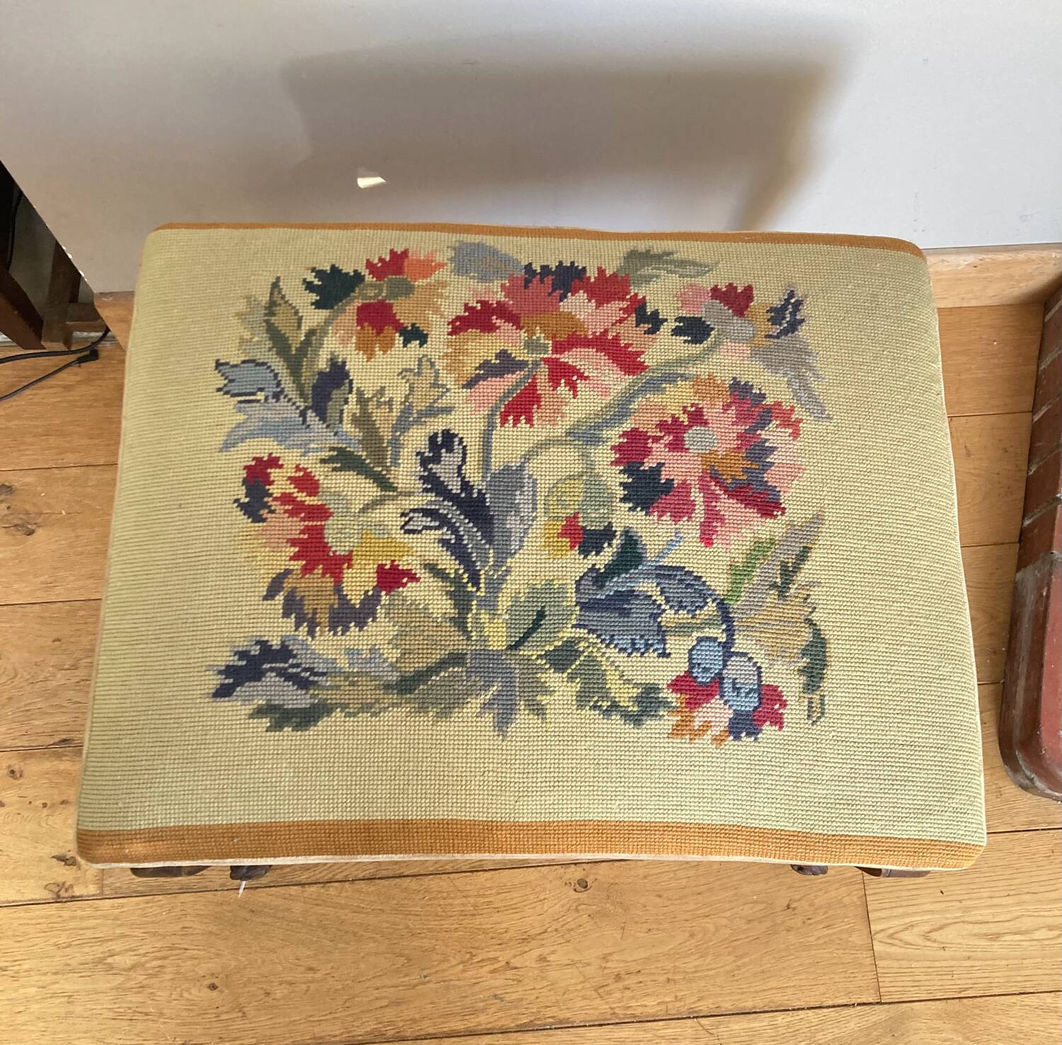 19th century Regency footrest with floral bouquet tapestry made with cross stitch