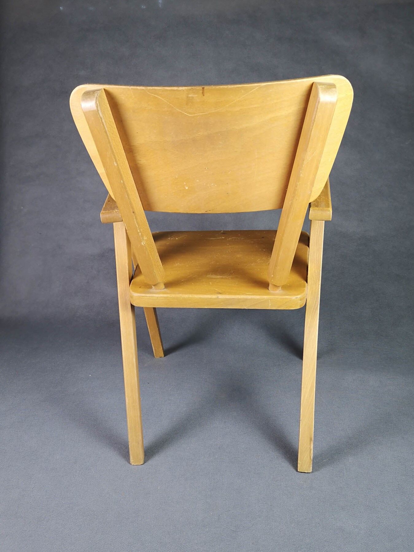 Vintage armchair child feet compass light wood