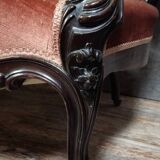 Very large Louis XV style mahogany banquette with medallions from the 19th century.
