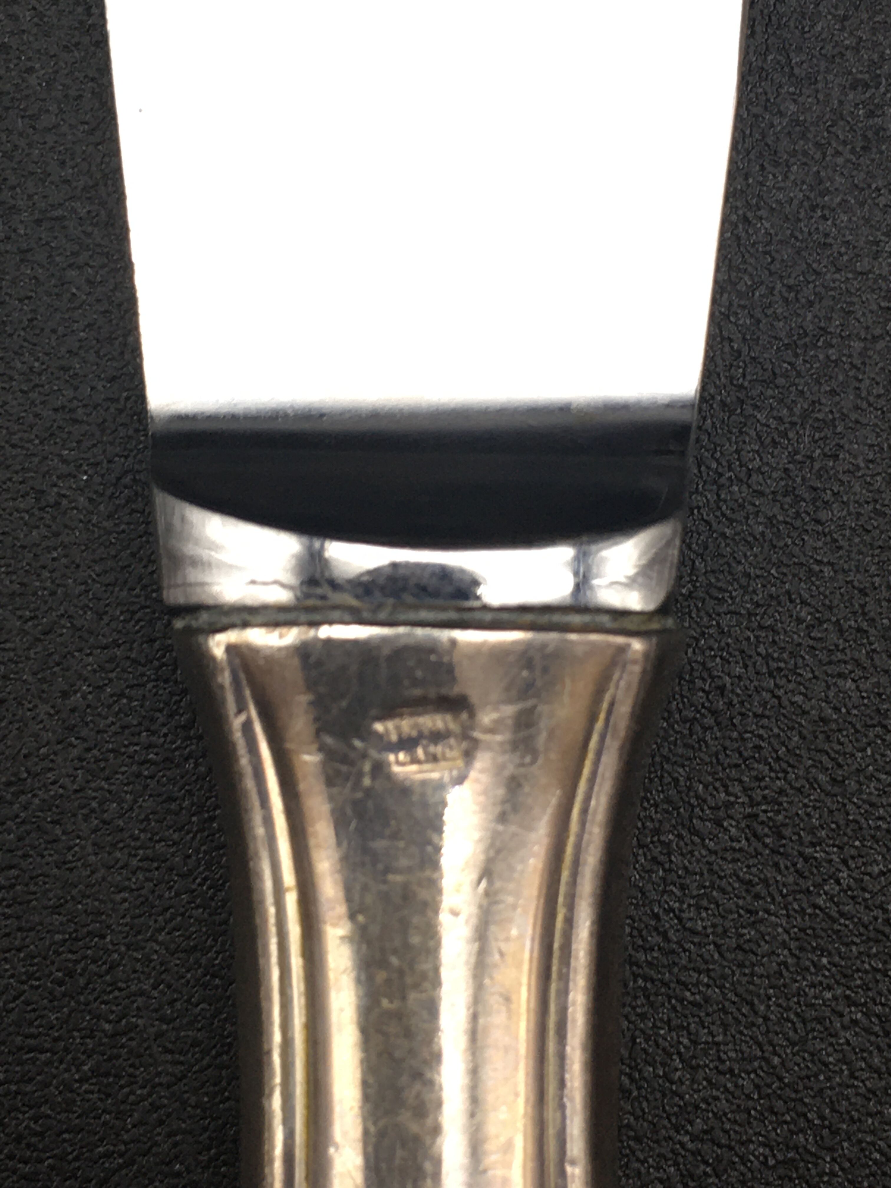 12 silver metal knives