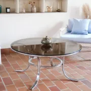 Round coffee table in smoked glass and chrome – Space Age style, 1970s