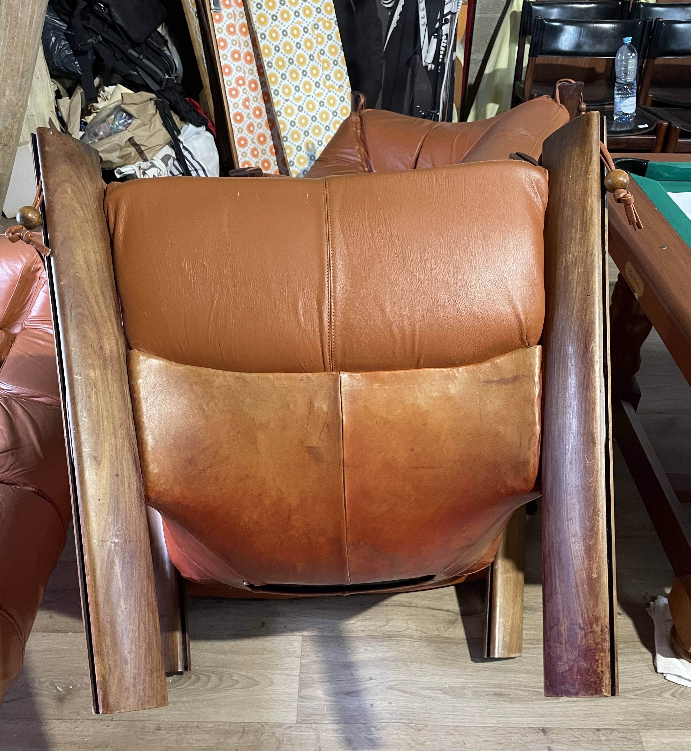 Percival lafer mp-211 sofa set with two armchairs and an ottoman in leather.
